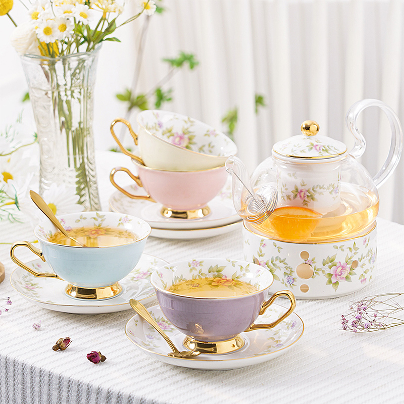 Elegant Bone China Tea Set with Glass Teapot, Infuser, Warmer, Coffee Cups, and Saucer - 10 Pieces Elegant Bone China Tea Set with Glass Teapot, Infuser, Warmer, Coffee Cups, and Saucer - 10 Pieces