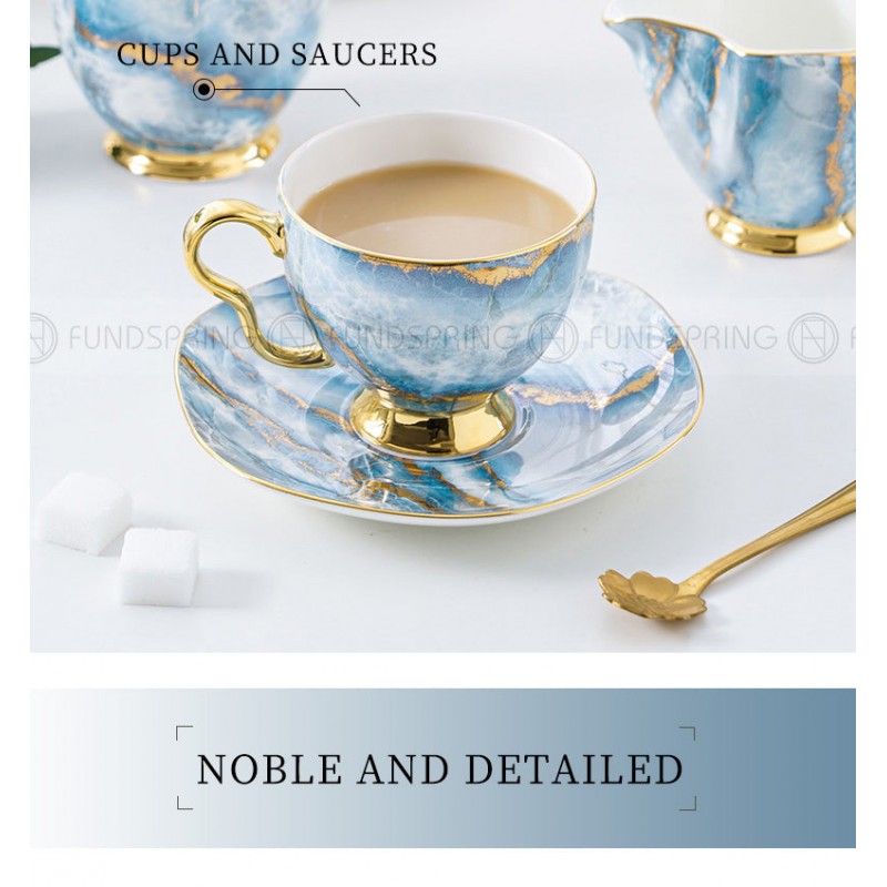 Elegant Bone China Tea Set with Saucers, Electric Blue Marble Pattern, and Coffee Cups - 15 Pieces Elegant Bone China Tea Set with Saucers, Electric Blue Marble Pattern, and Coffee Cups - 15 Pieces