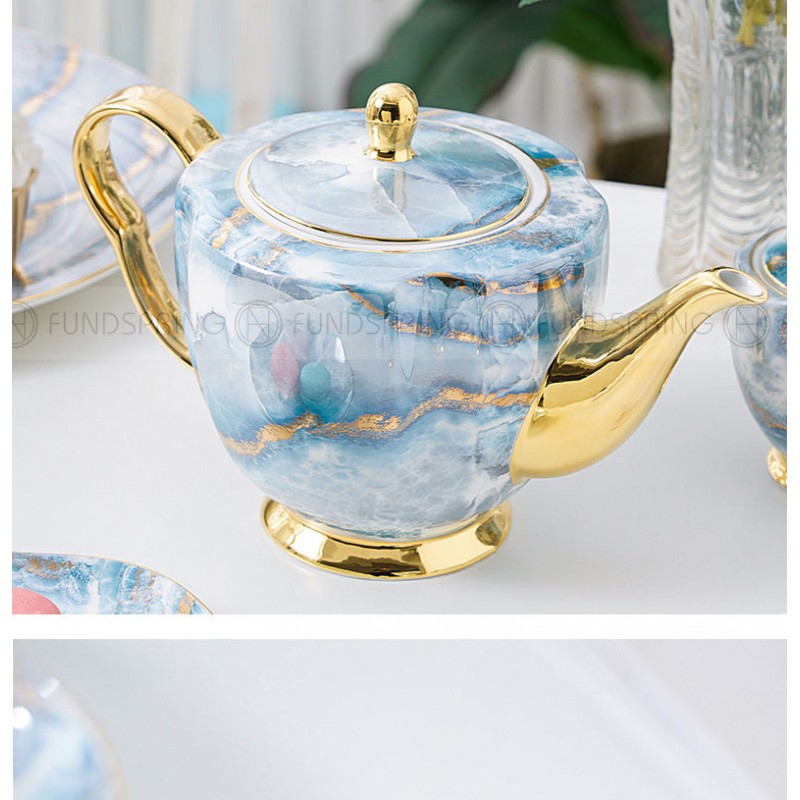 Elegant Bone China Tea Set with Saucers, Electric Blue Marble Pattern, and Coffee Cups - 15 Pieces Elegant Bone China Tea Set with Saucers, Electric Blue Marble Pattern, and Coffee Cups - 15 Pieces