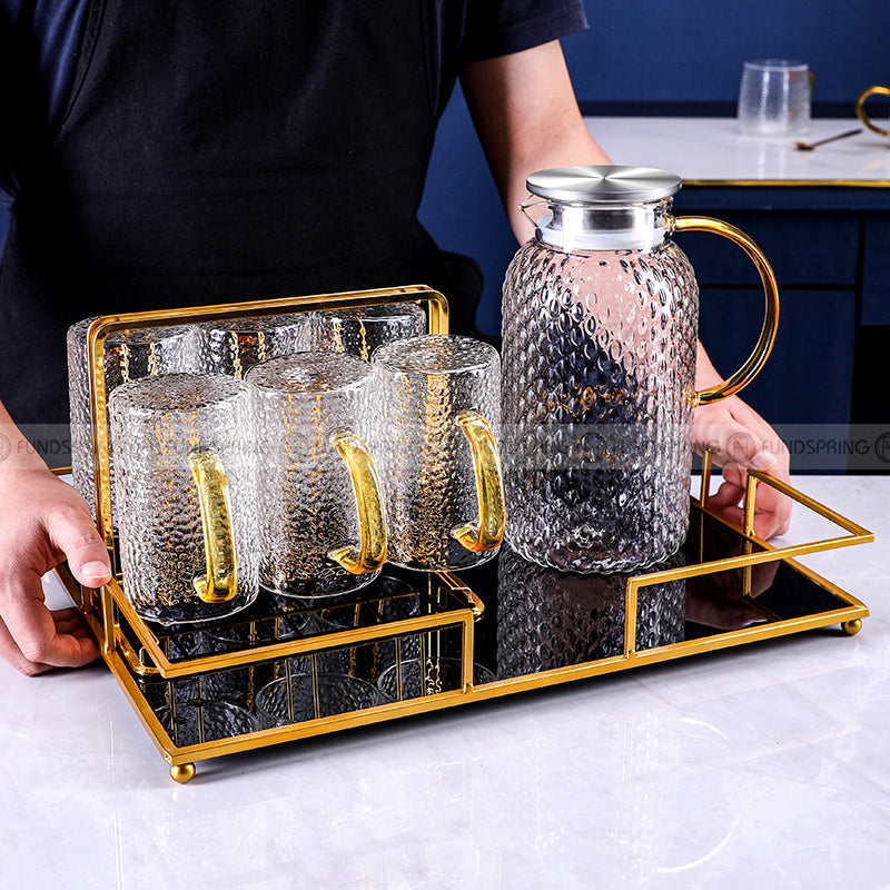 Sculpted Elegance: Hammered Borosilicate Glass Water Set with Pitcher and Cups Sculpted Elegance: Hammered Borosilicate Glass Water Set with Pitcher and Cups