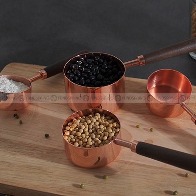 Thickened Copper Plated Baking Spoon Wooden Handle Measuring Cup Set of 4 Thickened Copper Plated Baking Spoon Wooden Handle Measuring Cup Set of 4