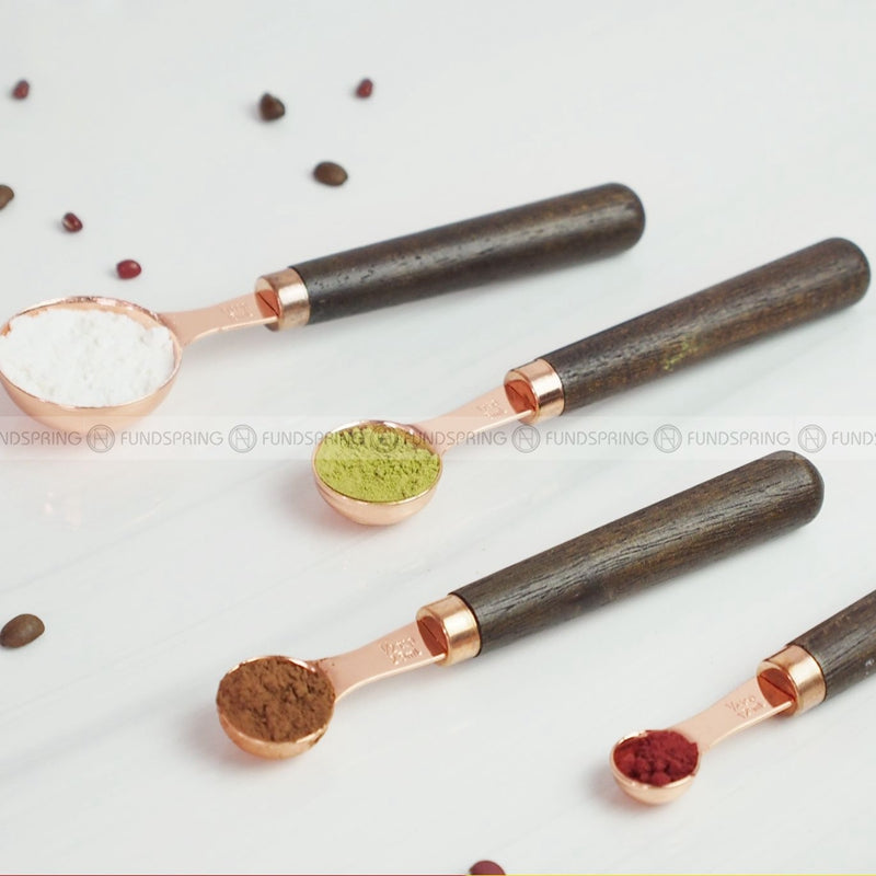 Set of 4 Rose Gold Stainless Steel Measuring Spoons with Elegant Wood Handles