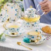 Elegant Bone China Tea Set with Glass Teapot, Infuser, Warmer, Coffee Cups, and Saucer - 10 Pieces Elegant Bone China Tea Set with Glass Teapot, Infuser, Warmer, Coffee Cups, and Saucer - 10 Pieces