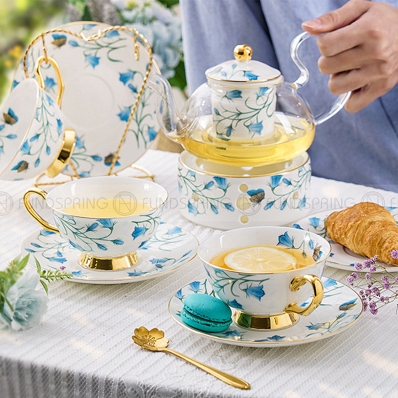Elegant Bone China Tea Set with Glass Teapot, Infuser, Warmer, Coffee Cups, and Saucer - 10 Pieces Elegant Bone China Tea Set with Glass Teapot, Infuser, Warmer, Coffee Cups, and Saucer - 10 Pieces