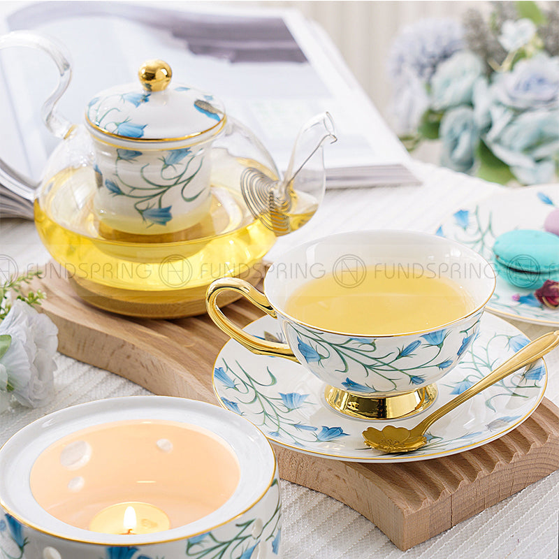 Elegant Bone China Tea Set with Glass Teapot, Infuser, Warmer, Coffee Cups, and Saucer - 10 Pieces Elegant Bone China Tea Set with Glass Teapot, Infuser, Warmer, Coffee Cups, and Saucer - 10 Pieces