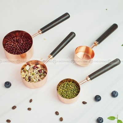 Thickened Copper Plated Baking Spoon Wooden Handle Measuring Cup Set of 4 Thickened Copper Plated Baking Spoon Wooden Handle Measuring Cup Set of 4