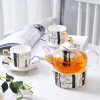 Bone China Tea Set with Infuser and Warmer, Marble Pattern, Glass Teapot and Tea Cups with Saucers - Set of 10 Bone China Tea Set with Infuser and Warmer, Marble Pattern, Glass Teapot and Tea Cups with Saucers - Set of 10