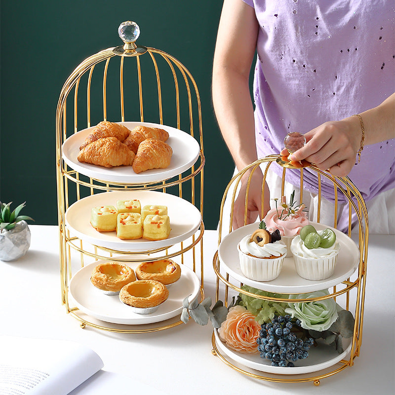 Ceramic Cake and Dessert Table Stand in the Form of a Birdcage Display Shelf for Afternoon Tea Ceramic Cake and Dessert Table Stand in the Form of a Birdcage Display Shelf for Afternoon Tea