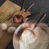 Thickened Copper Plated Baking Spoon Wooden Handle Measuring Cup Set of 4 Thickened Copper Plated Baking Spoon Wooden Handle Measuring Cup Set of 4