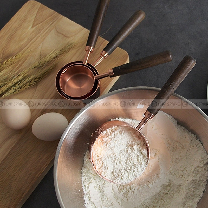 Thickened Copper Plated Baking Spoon Wooden Handle Measuring Cup Set of 4 Thickened Copper Plated Baking Spoon Wooden Handle Measuring Cup Set of 4