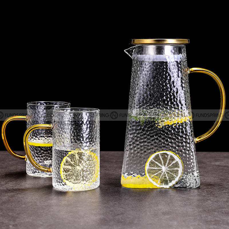Sculpted Elegance: Hammered Borosilicate Glass Water Set with Pitcher and Cups Sculpted Elegance: Hammered Borosilicate Glass Water Set with Pitcher and Cups