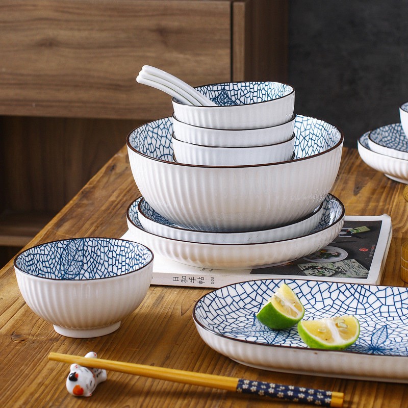 Harmony in Design: 40-Piece Vertical Pattern Underglaze Ceramic Dinnerware Set Harmony in Design: 40-Piece Vertical Pattern Underglaze Ceramic Dinnerware Set