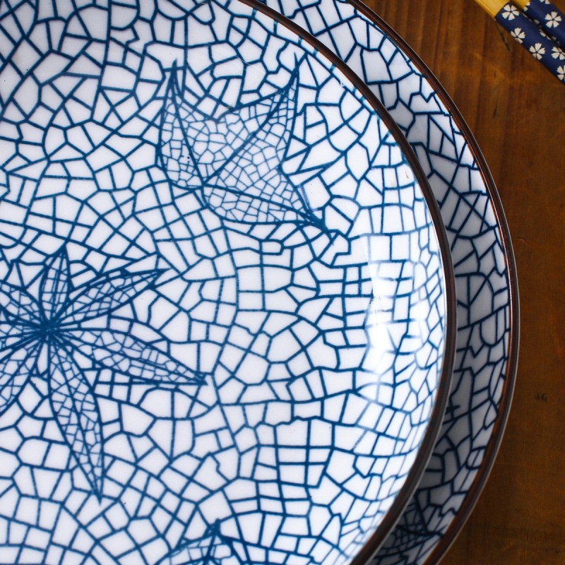 Harmony in Design: 40-Piece Vertical Pattern Underglaze Ceramic Dinnerware Set Harmony in Design: 40-Piece Vertical Pattern Underglaze Ceramic Dinnerware Set