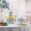 Elegant Bone China Tea Set with Glass Teapot, Infuser, Warmer, Coffee Cups, and Saucer - 10 Pieces Elegant Bone China Tea Set with Glass Teapot, Infuser, Warmer, Coffee Cups, and Saucer - 10 Pieces
