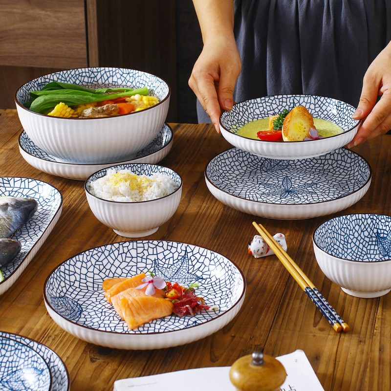 Harmony in Design: 40-Piece Vertical Pattern Underglaze Ceramic Dinnerware Set Harmony in Design: 40-Piece Vertical Pattern Underglaze Ceramic Dinnerware Set
