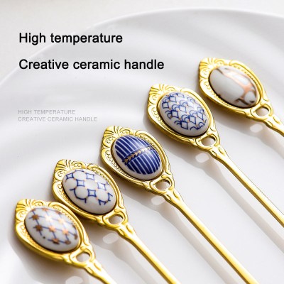 Gold Stainless Steel Small Fork For Dessert and Fruit With Ceramic Ornamented Handle Gold Stainless Steel Small Fork For Dessert and Fruit With Ceramic Ornamented Handle